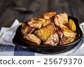 Baked potato wedges with garlic, christmas garnish 25679370