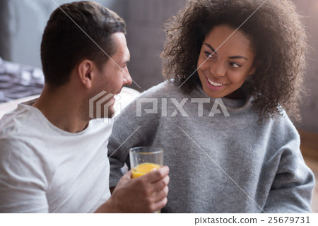 Happy couple enjoying their honeymoon morning Happy couple enjoying their honeymoon morning 25679731