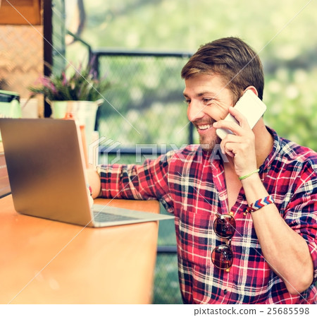 Young Man Outdoors Talking Smartphone Concept Young Man Outdoors Talking Smartphone Concept 25685598