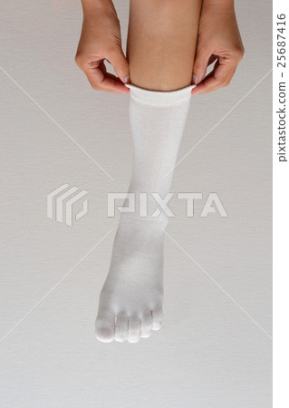 Socks to counteract cold. 25687416