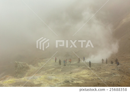 Climbing to active volcano Mutnovsky on Kamchatka. 25688358