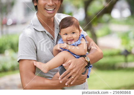 carrying kid carrying kid 25690868