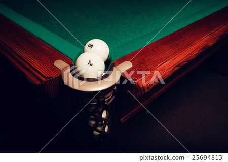 Billiard balls near pocket Billiard balls near pocket 25694813