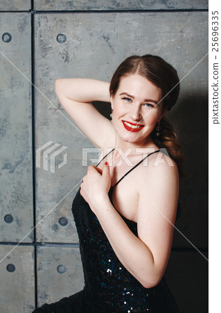 Seductive sexy model posing in loft interior 25696335