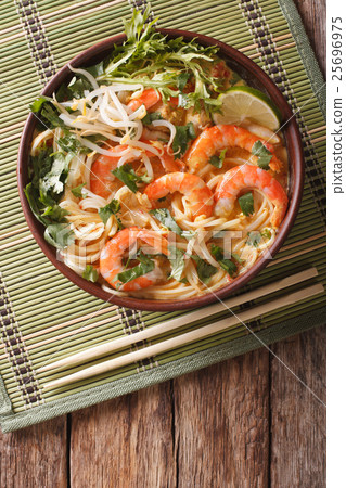 Malaysian laksa soup with shrimps, noodles Malaysian laksa soup with shrimps, noodles 25696975