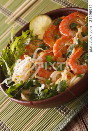 Malaysian laksa soup with prawns close up Malaysian laksa soup with prawns close up 25696985