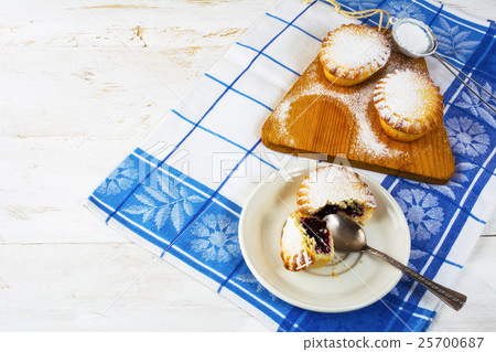 Small dessert pie on the white plate 25700687