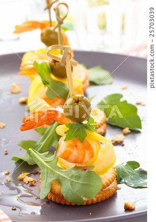 Canapes with prawns. 25703039