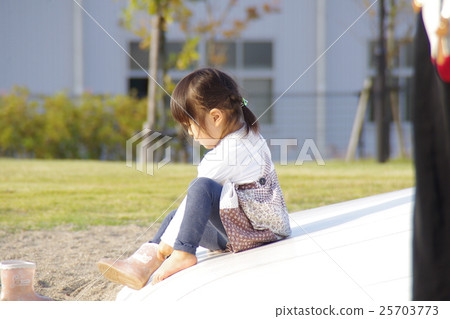 A girl holding a boots A girl holding a boots 25703773