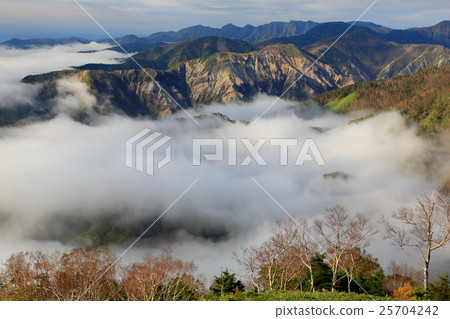 Mountain ranges of the sea of clouds and Ashio from the Shonan mountain ridgeline on the south coast of Chuzenji Lake 25704242