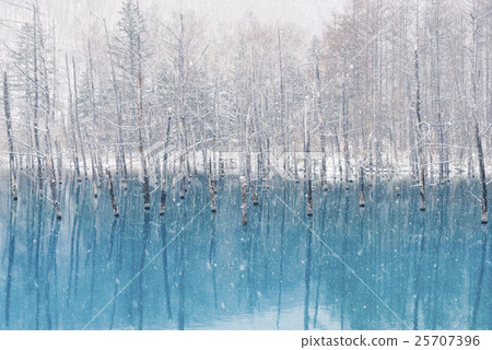 Blue pond and snow 1 25707396