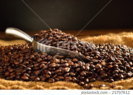 Coffee beans on burlap 25707612