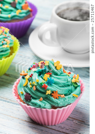 Fresh cupcakes and hot coffee Fresh cupcakes and hot coffee 25711467