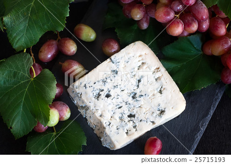 Blue cheese with grape background 25715193