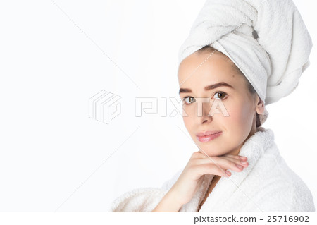 Pretty young woman with white towel on her head Pretty young woman with white towel on her head 25716902