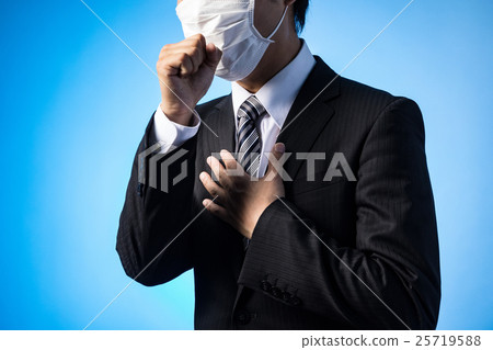 A masked businessman, a cough A masked businessman, a cough 25719588