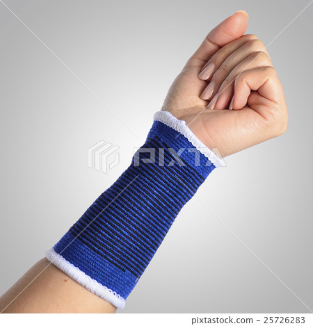 Hand with a orthopedic wrist brace 25726283
