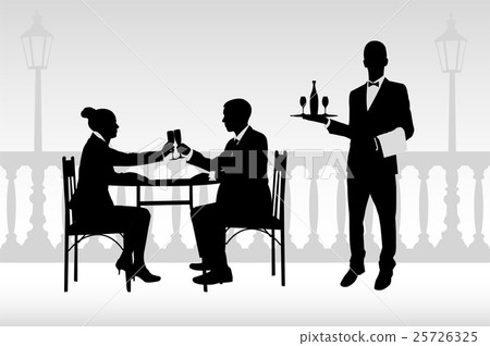 couple in the restaurant and waiter serving them 25726325