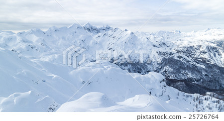 Freeride snowboarder on the top of the mountain. 25726764