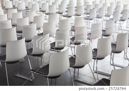 Empty white chairs in contemporary conference hall Empty white chairs in contemporary conference hall 25728764