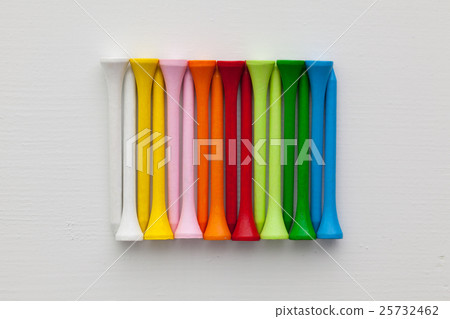 Detail of different  golf tees on the wooden table 25732462