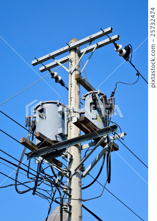 Telephone pole under the blue sky Telephone pole under the blue sky 25732474