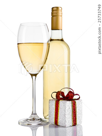 Bottle and glass of white wine and gift box Bottle and glass of white wine and gift box 25733749