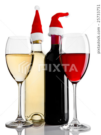 Bottles and glasses of red white wine santa hat Bottles and glasses of red white wine santa hat 25733751