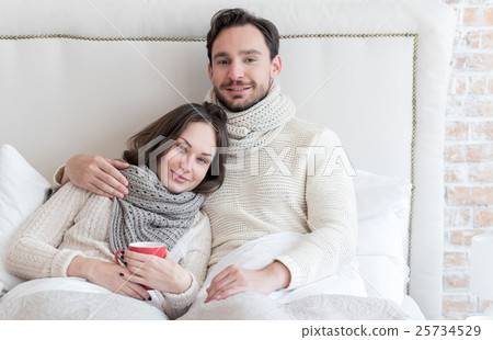 Joyful bearded man hugging his girlfriend 25734529