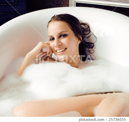 young cute sweet brunette woman taking bath, happy young cute sweet brunette woman taking bath, happy 25736035