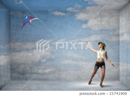 Girl and flying kite Girl and flying kite 25741909
