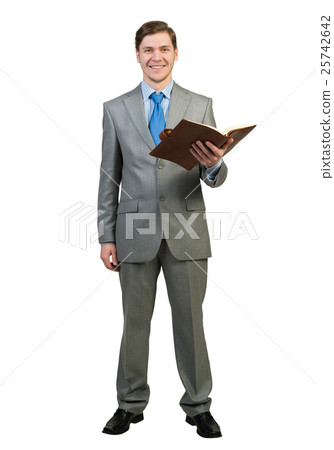 Businessman reading book 25742642