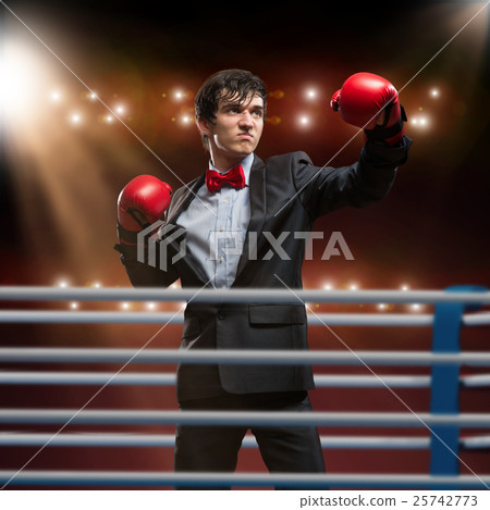 businessman with boxing gloves in the ring 25742773