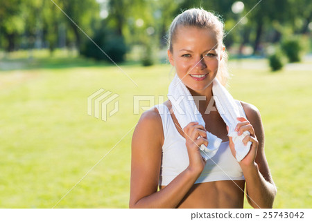attractive woman with a white towel attractive woman with a white towel 25743042