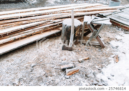 Firewood chopping workplace frosted by snow Firewood chopping workplace frosted by snow 25746814
