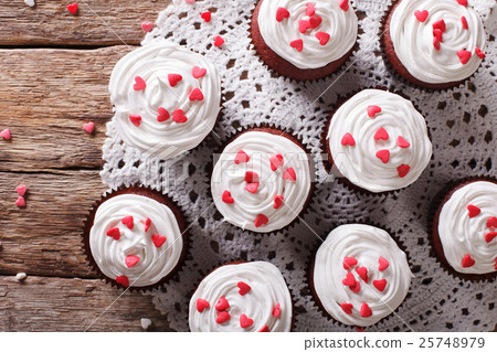 red velvet cupcakes decorated with hearts 25748979