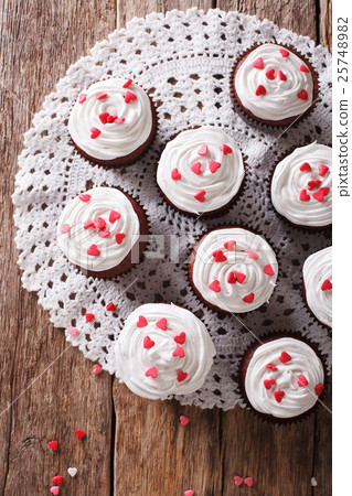 red velvet cupcakes decorated with hearts 25748982