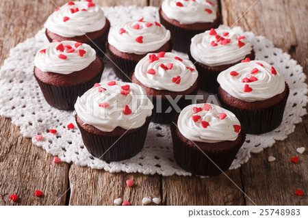 tasty red velvet cupcakes close-up 25748983