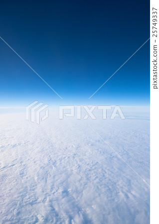 Blue sky and white clouds airplane window Blue sky and white clouds airplane window 25749337