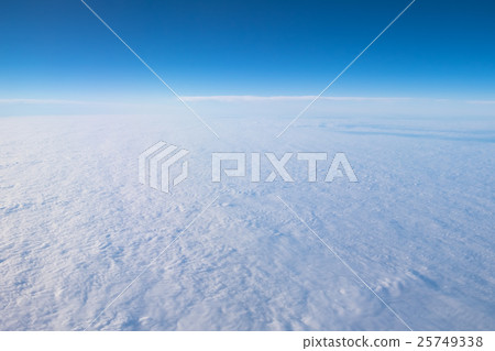 Blue sky and white clouds airplane window 25749338