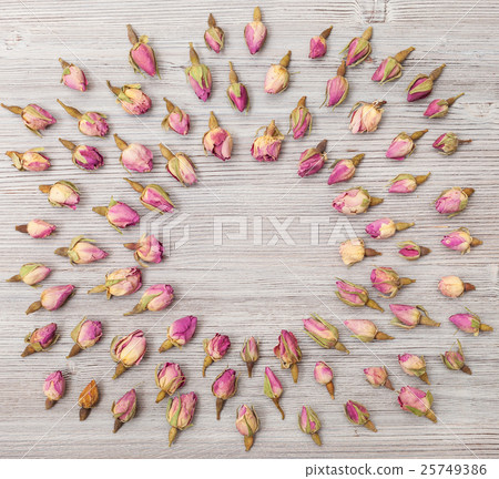 round frame from pink rose flowers on wooden plank round frame from pink rose flowers on wooden plank 25749386