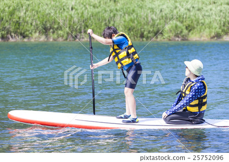 Parents playing marine sports Parents playing marine sports 25752096