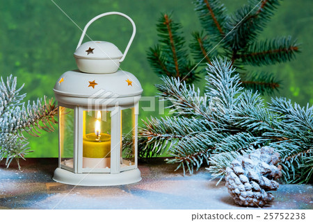 lantern and Christma tree in the snow 25752238