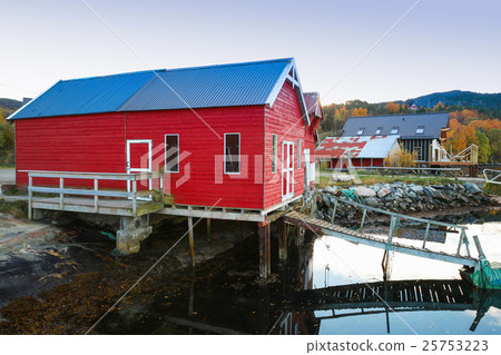 Norwegian red wooden fishing barn Norwegian red wooden fishing barn 25753223