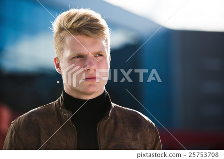 Young handsome stylish man in brown jacket in Young handsome stylish man in brown jacket in 25753708