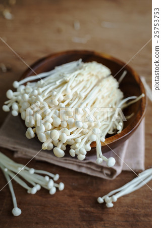 Enoki mushroom on old wooden table Enoki mushroom on old wooden table 25753753