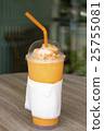 Thai tea smoothie on wooden table 25755081