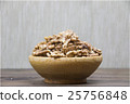 Walnuts in wooden bowl 25756848