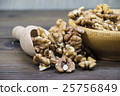 Walnuts in wooden bowl 25756849