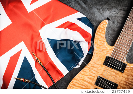 Electric guitar on grey background 25757439